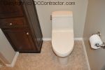 A Bathroom with Staron Countertop Shower with Bench Seat Custom Dark Oak Cabinetry Vinyl Flooring (13) sm